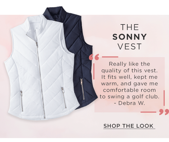 A white and black full-zip puffer vest with pockets