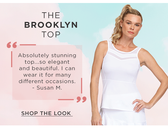 Woman in a white tank top with mesh details and peplum hem