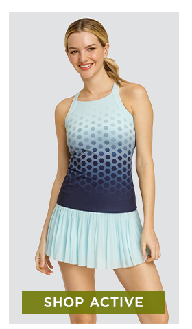 Woman in light and dark blue ombre hexagon print tank and light blue pleated skort