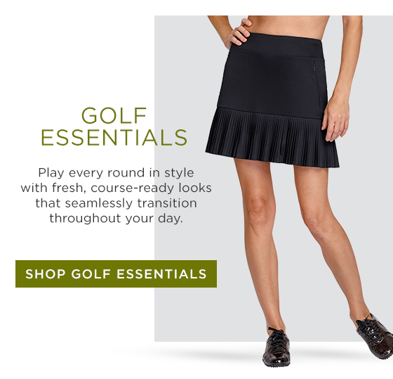 Woman in black skort with micropleated hem