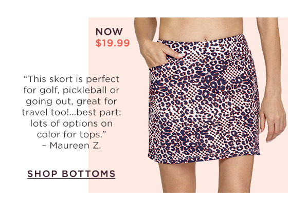 Woman in white, blue and red cheetah print skort