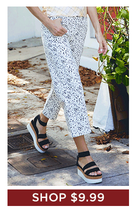 Woman in white polka dotted pants