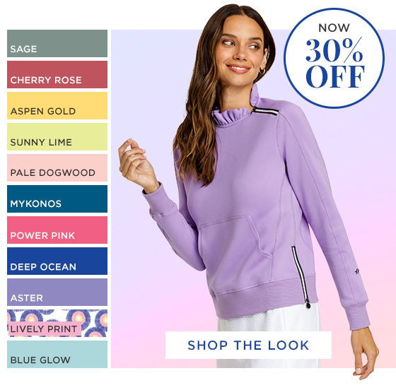 Woman in light purple long sleeve pullover with ruffle collar and zipper detail