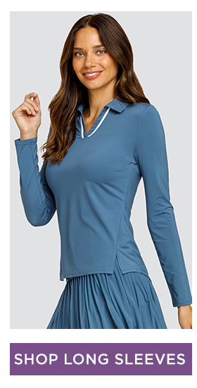 Woman in dusty blue long sleeve top