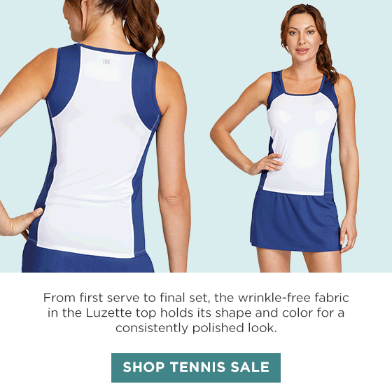 Woman in white and blue tank top and blue skort