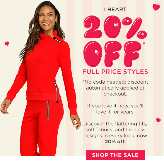 Woman in red long sleeve pullover with ruffle collar and matching jogger pants