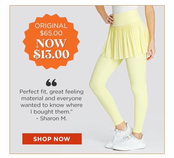 Model in yellow skirted leggings