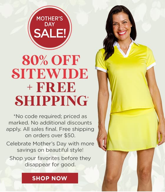 Model in yellow short sleeve top with yellow skort