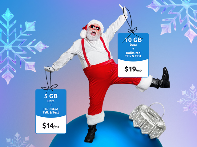 A picture of Santa holding plan cards on what looks like Christmas globes
