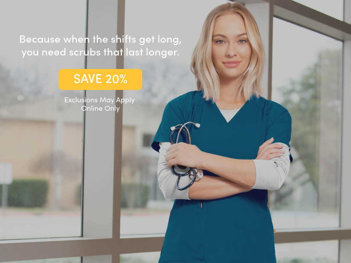 Woman wearing Wink Scrubs. Shop Wink 20% off