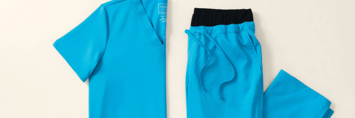 a pair of blue scrubs. Cherokee Workwear, iconic quality.