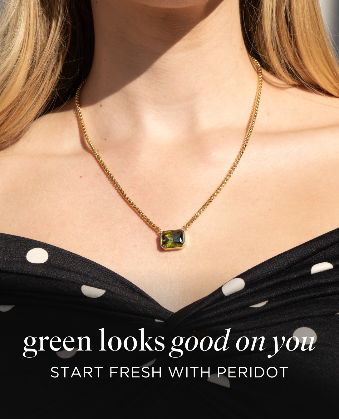 an image of a woman with long blonde hair wearing a necklace with a pink stone