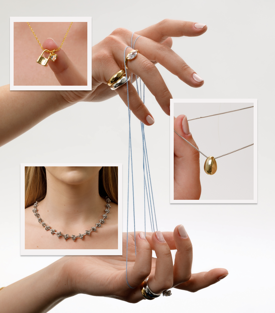 an image of a collection of jewelry including a necklace, ring, and a ring