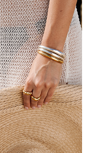 Silver bangle in organic shape
