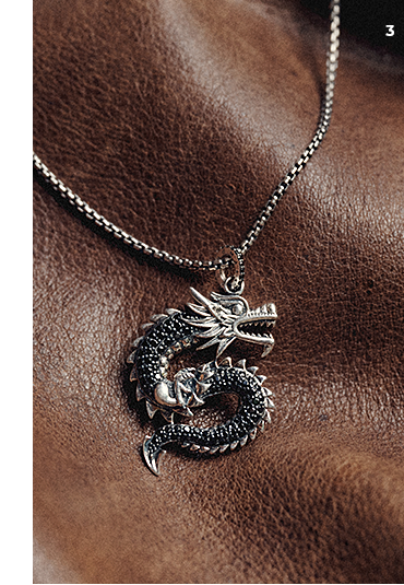 Silver blackened dragon pendant with black zirconia