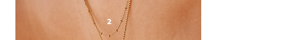 Round belcher chain yellow gold worn by a women