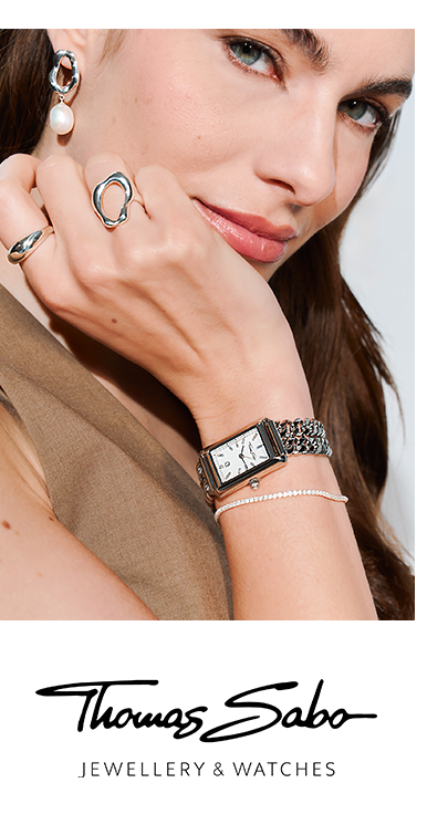 Image showing a woman wearing multiple pieces of jewelry from Bold Elegance
