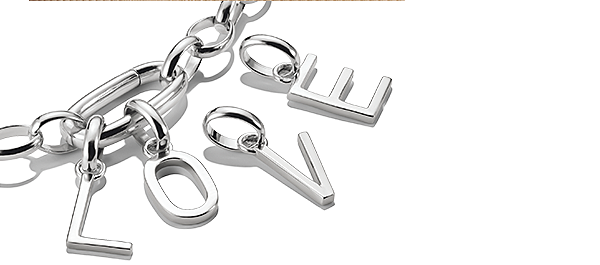 Image showing four Charms Connect that spell out the word 'Love'