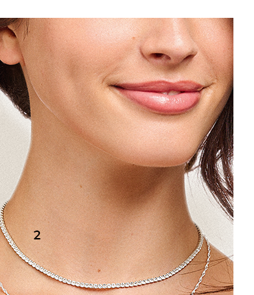 Silver necklace with white stones