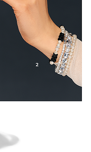 Silver pearl bracelet with 5 black Goldbears