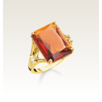 Ring with large orange stone and stars gold plated