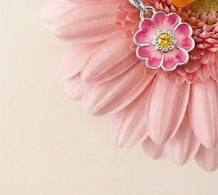Silver charm pendant with pink flower