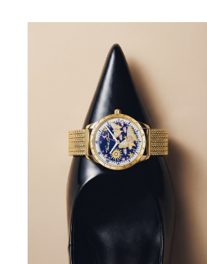 Gold-coloured ladies' watch with butterflies