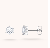 Silver ear studs with white zirconia in brilliant cut