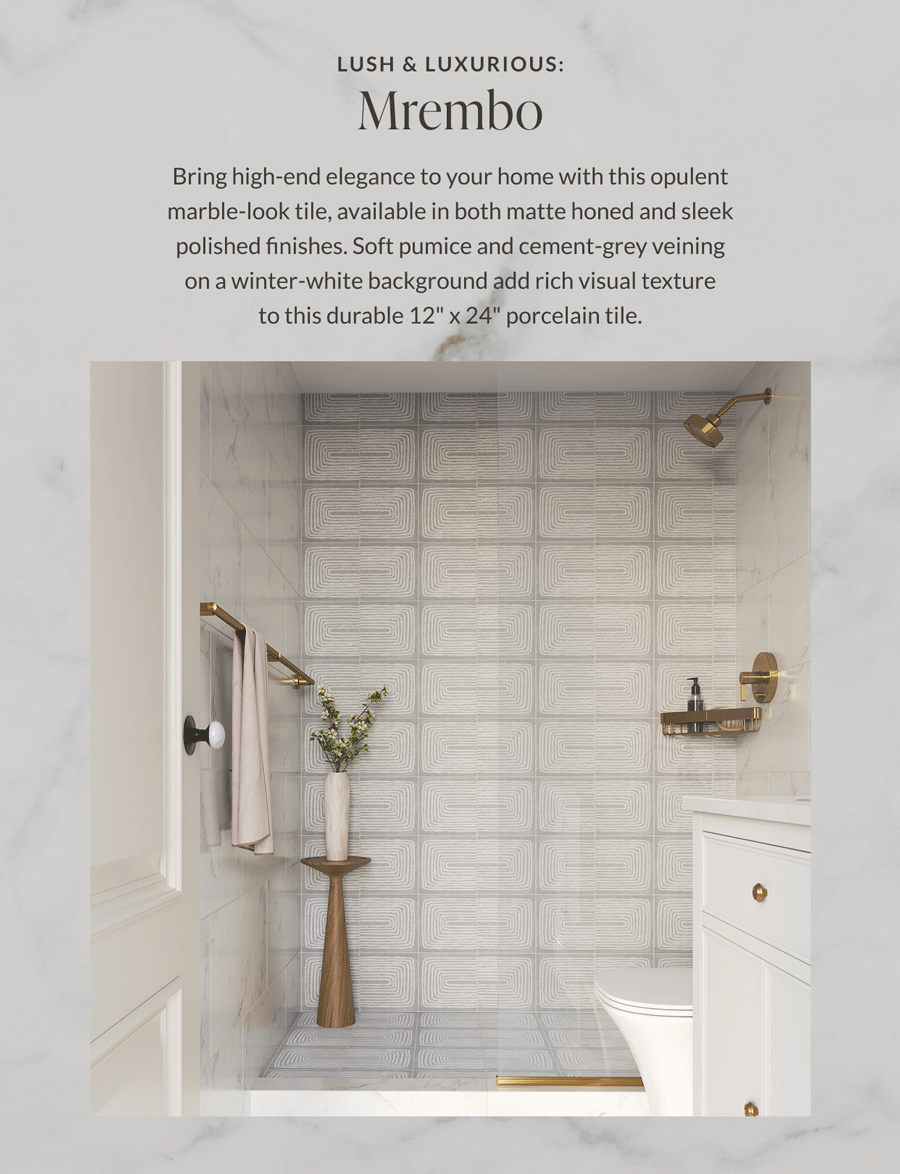 Lush & Luxurious: Mrembo - Bring high-end elegance to your home with this opulent marble-look tile, available in both matte honed and sleep polished finishes. Soft pumice and cement-grey veining on a winter-white background add rich visual texture to this durable 12" x 24" porcelain tile. 