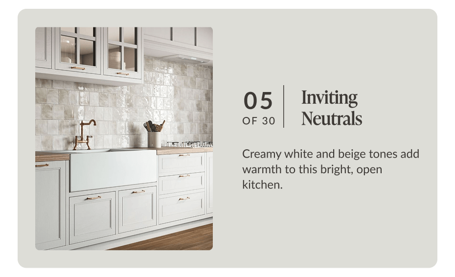 05 of 30 - Inviting Neutrals: Creamy white and beige tones add warmth to this bright, open kitchen.
