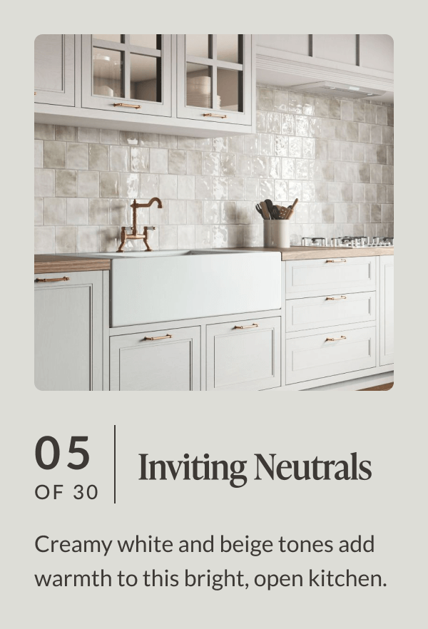 05 of 30 - Inviting Neutrals: Creamy white and beige tones add warmth to this bright, open kitchen.