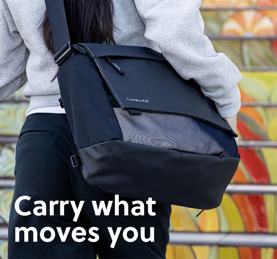 Model wearing the Stark Messenger with text "Carry what moves you"