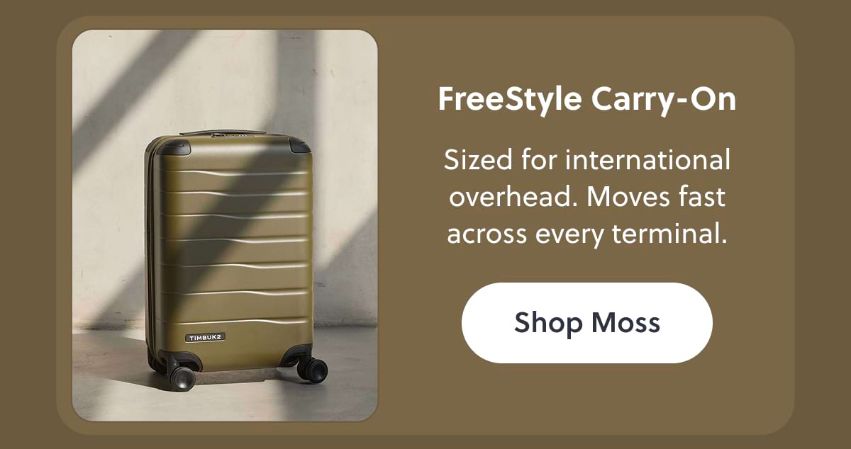 FreeStyle Carry-On | Sized for international overhead. Moves fast across every terminal. Shop Moss