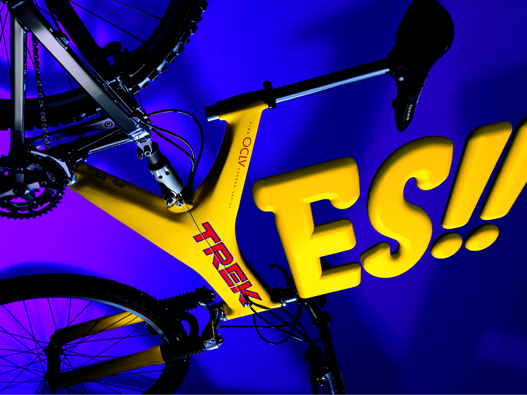 A cyclist riding a Trek bike in a vibrant, high-energy moment with bold graphic typography expressing excitement for the brand