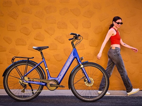 Rider exploring a tree-lined path on a Verve+ e-bike