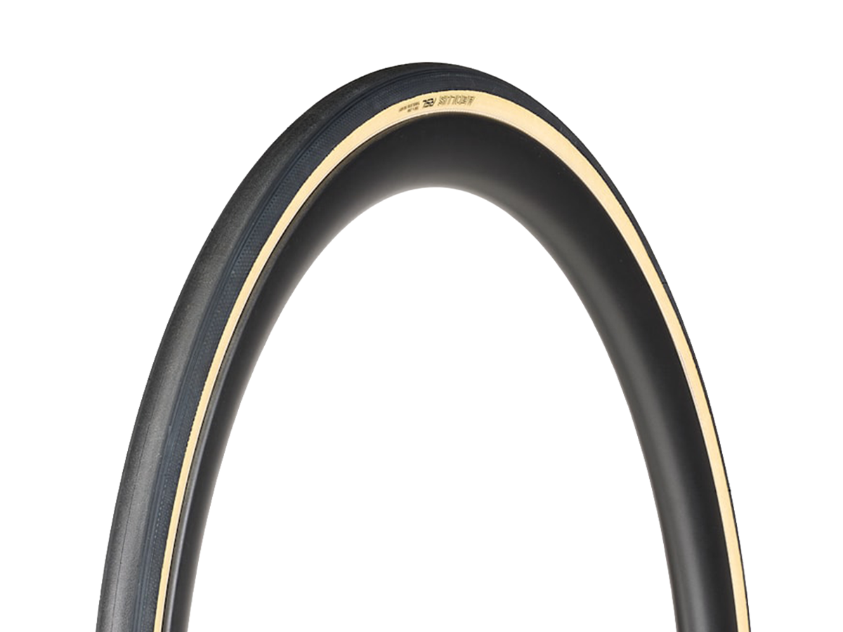 Bontrager Aeolus road tire with tan sidewall on white background