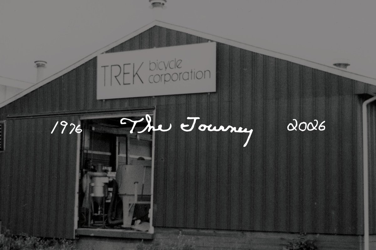 Black-and-white photo of the original Trek Bicycle Corporation building, with handwritten text reading 1976, The Journey, 2076