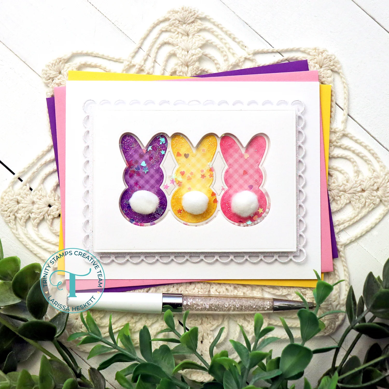 Sweet and simple Easter greeting card featuring 3 bunny cutouts with fluffy white tails