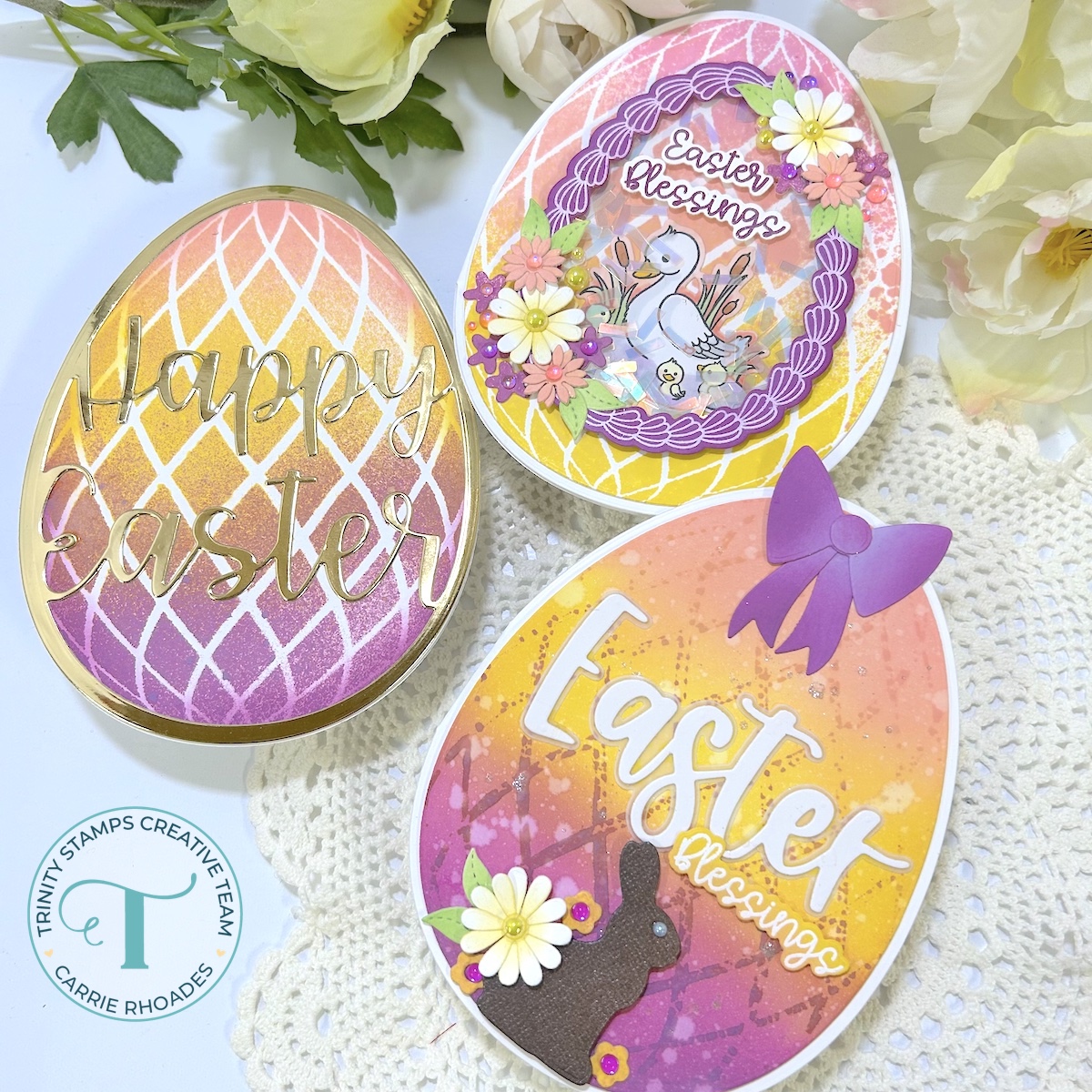 Trio of egg-shaped Easter cards in shades of purple, yellow, pink, and orange
