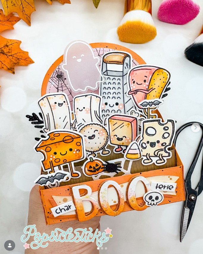 Greeting card featuring a collection of cheese-themed characters with a Halloween twist