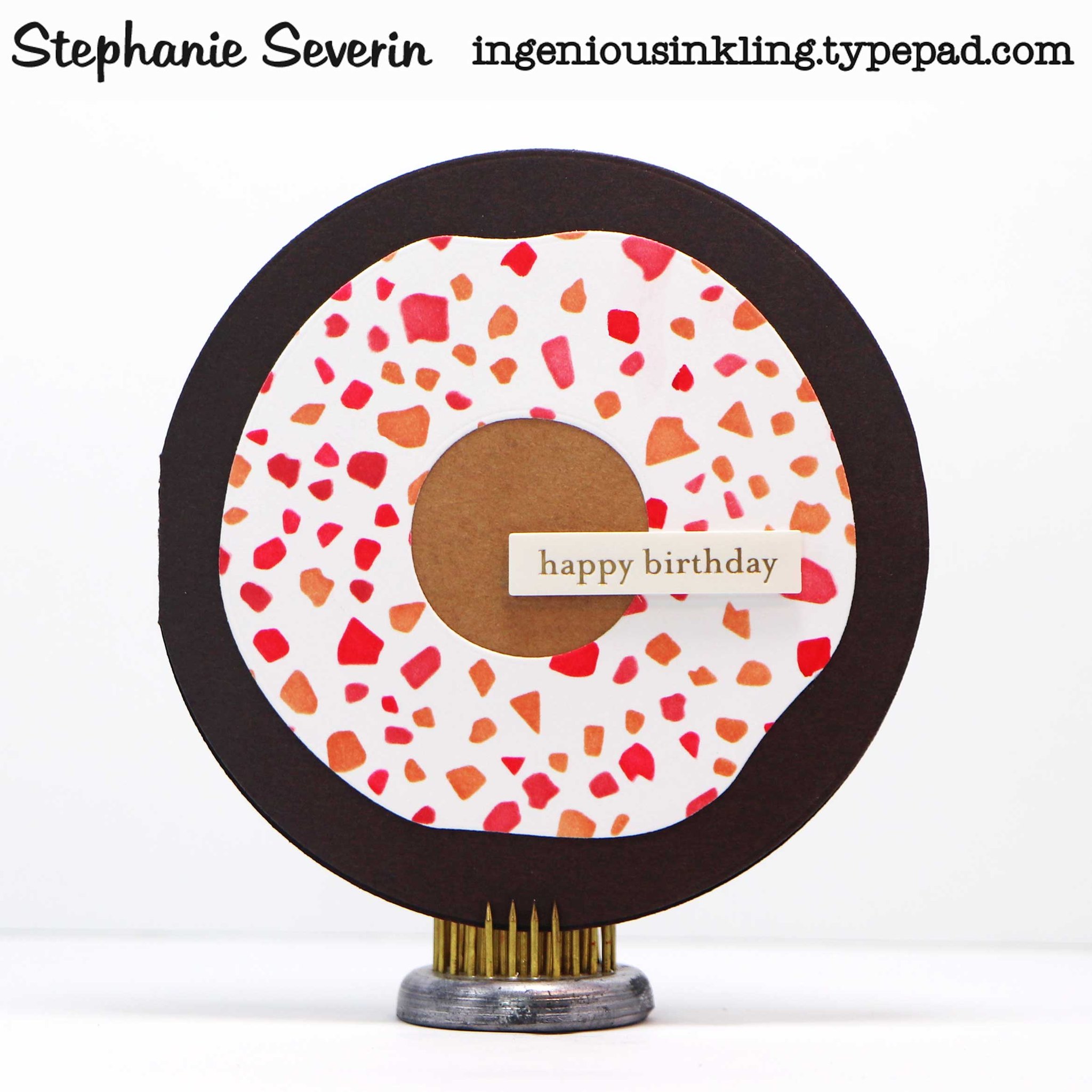 Donut-themed birthday greeting card in brown and red tones