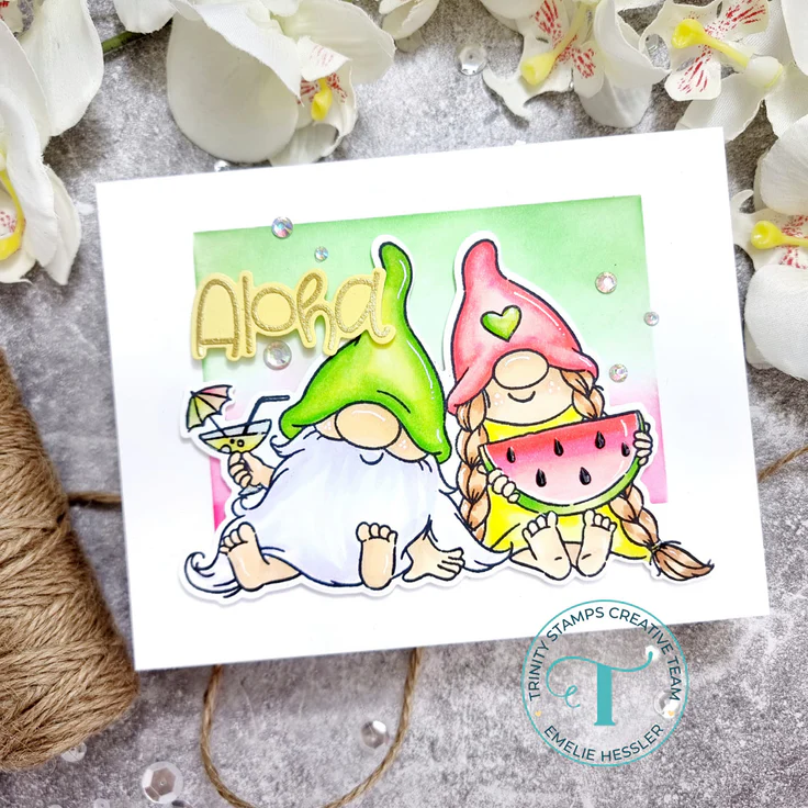 Summery gnomes on ink blended background reading "Aloha"