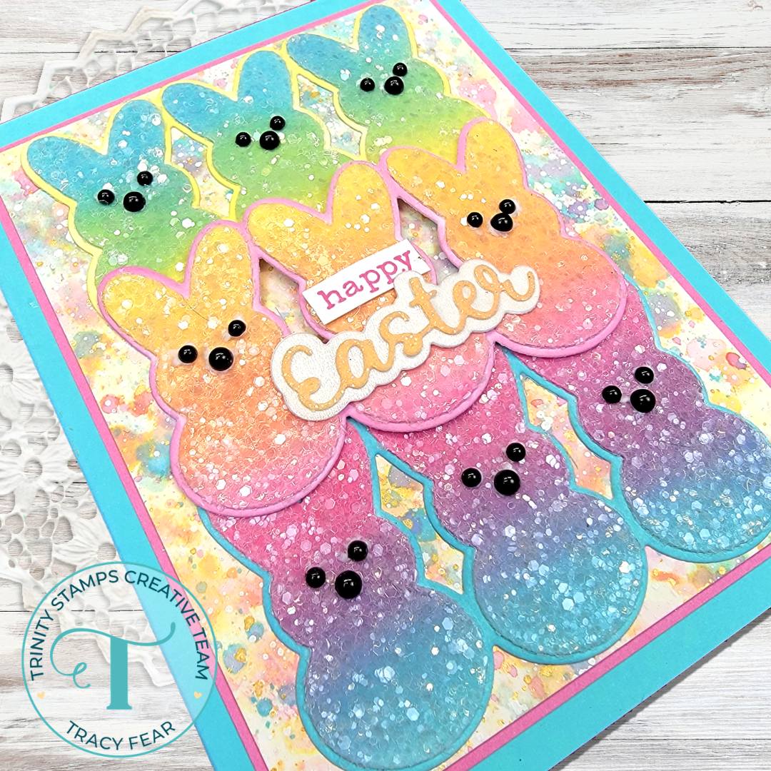 A rainbow of bunny rows saying "happy Easter"