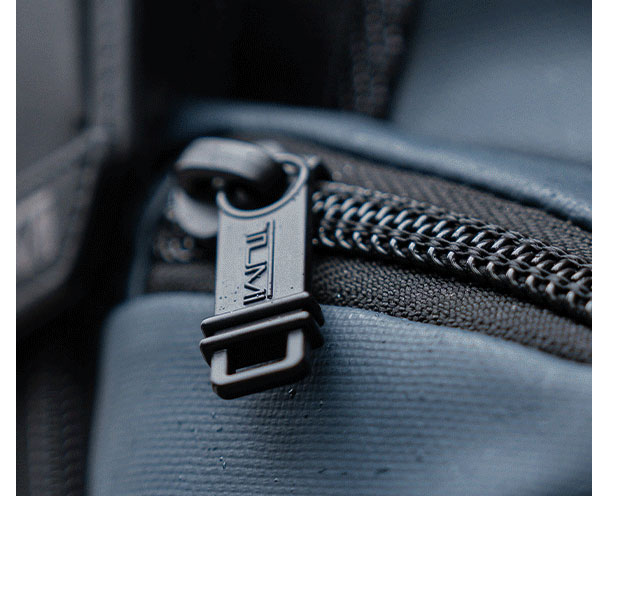 Discover Alpha Bravo in this season's new Navy Coated Canvas