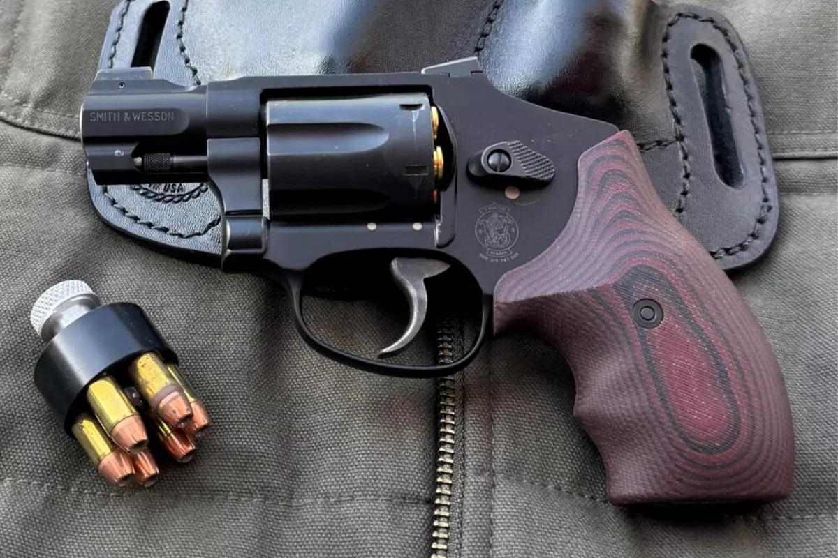 Closeup of black and brown revolver