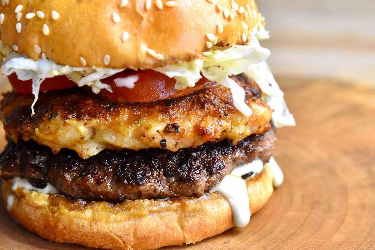 Closeup of juicy surf and turf burger