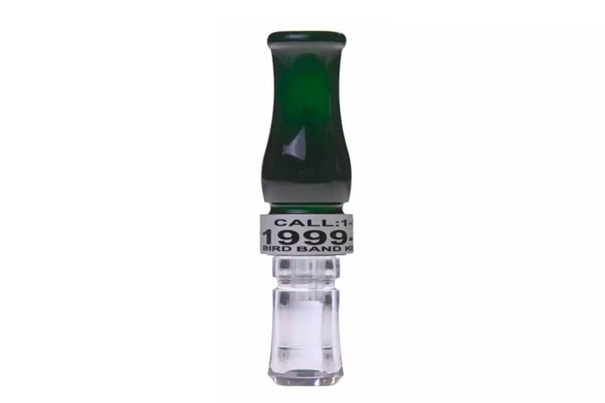 Black and clear duck call against a white background