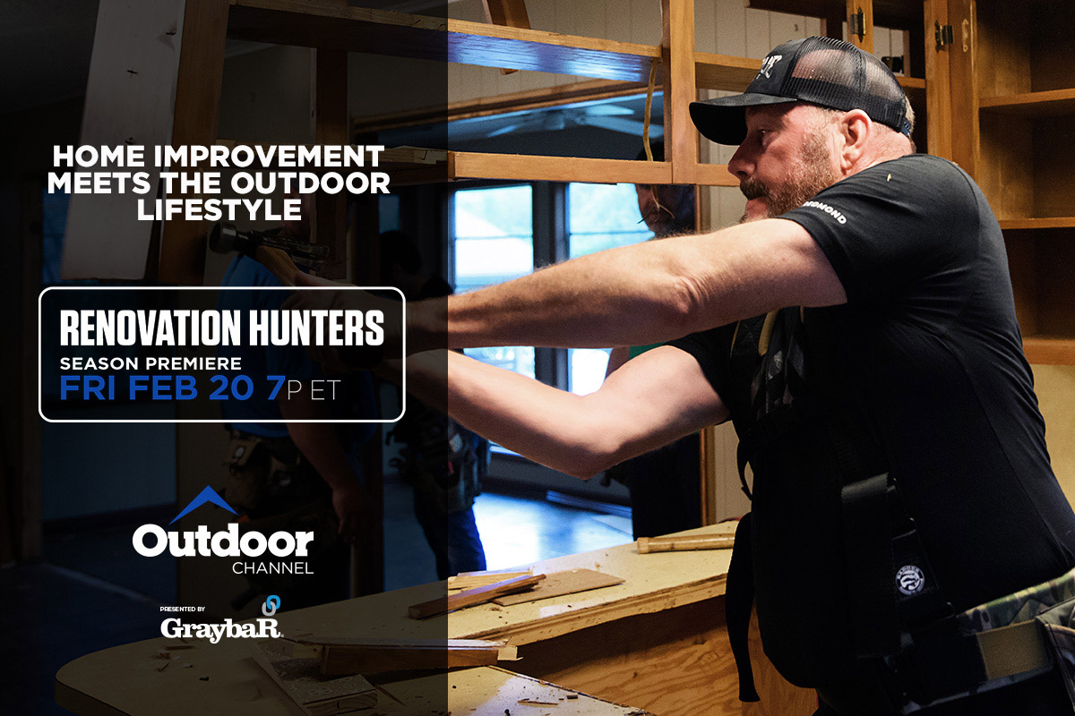 Man in ballcap and black shirt putting wooden structure together with power tools