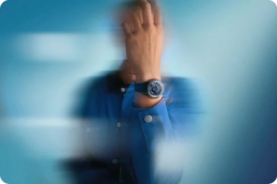 An image of a man showing his wrist with a Freak ONE NAVY BLUE on it.