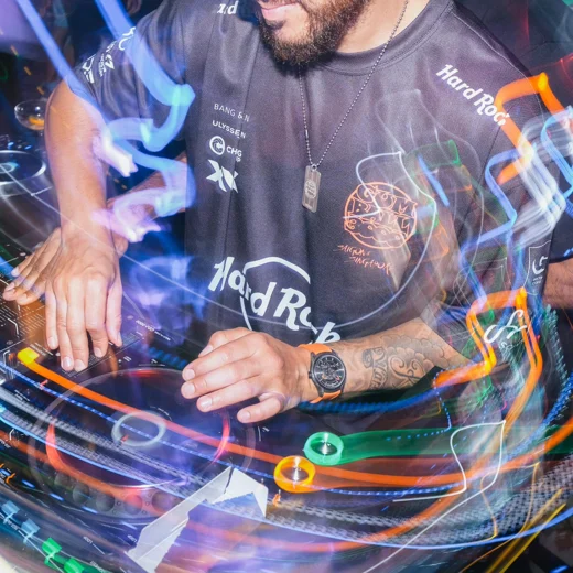 DJ wearing Freak X Gumball 3000 at the wheel